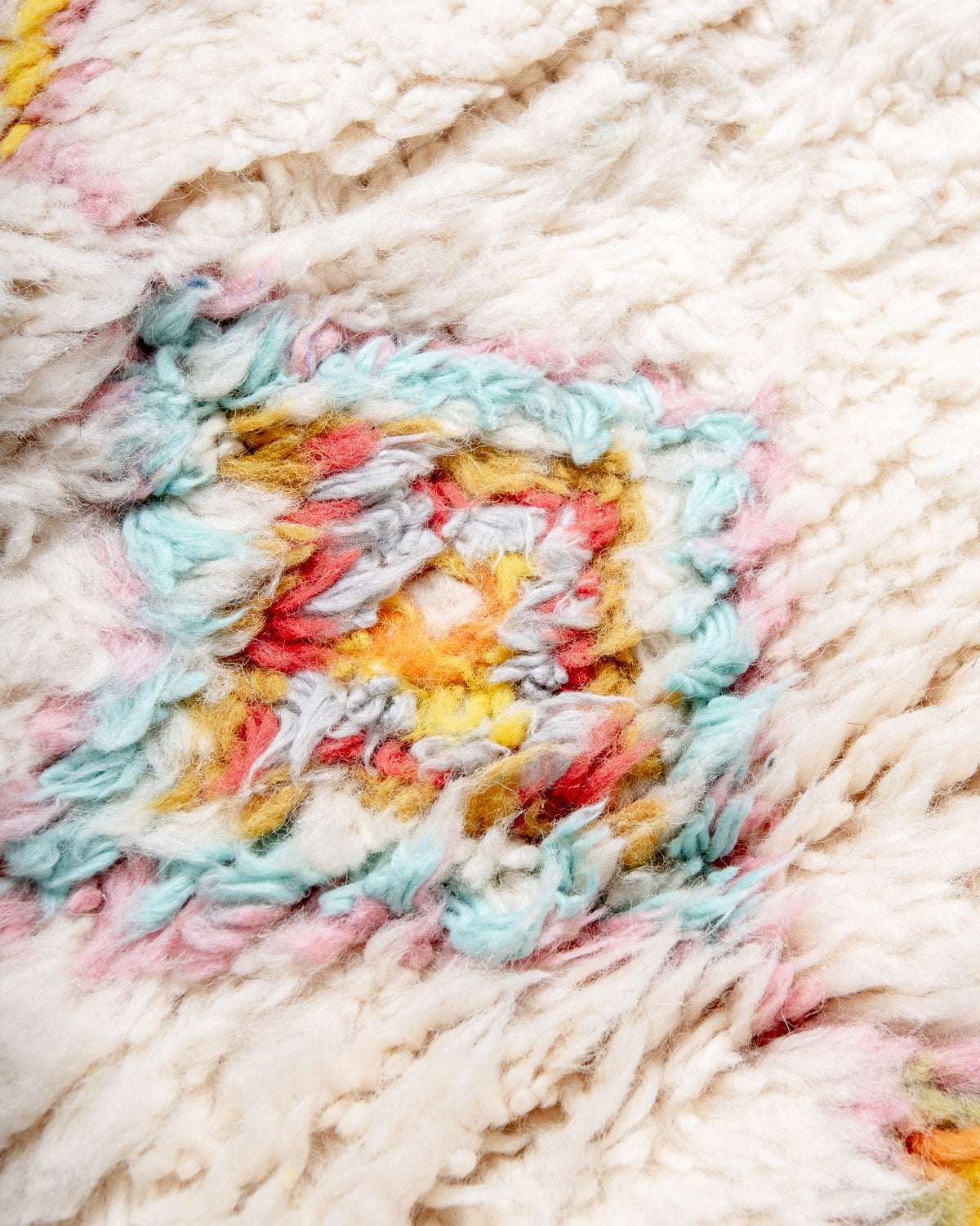 Modern, designer, handcrafted Berber rug from Morocco. Beniourain carpet with beautiful colours and patterns and fluffy wool texture.